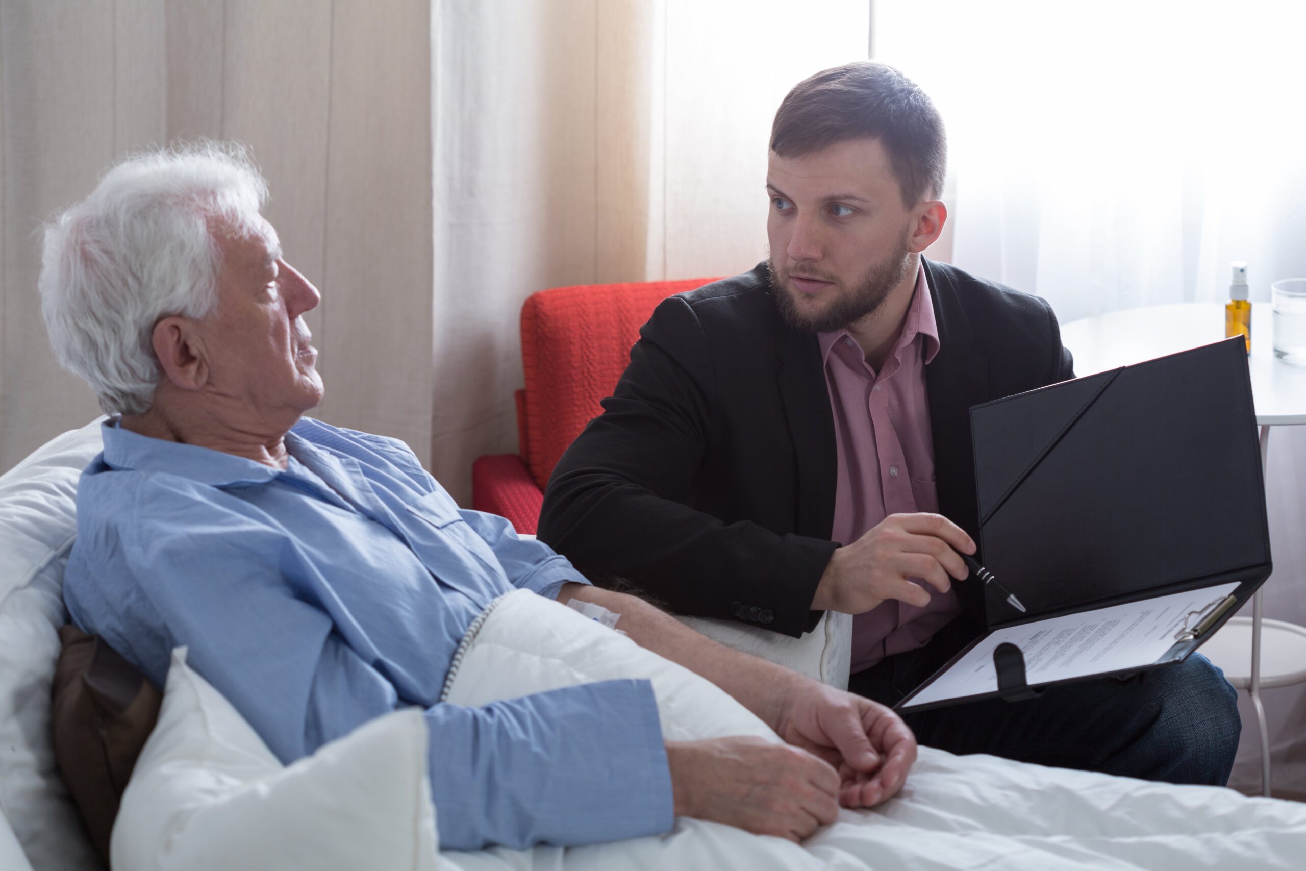 Colchester probate solicitor talking with elderly man